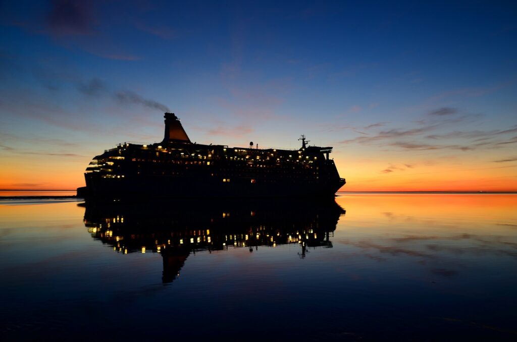 Ship at sea at sunset